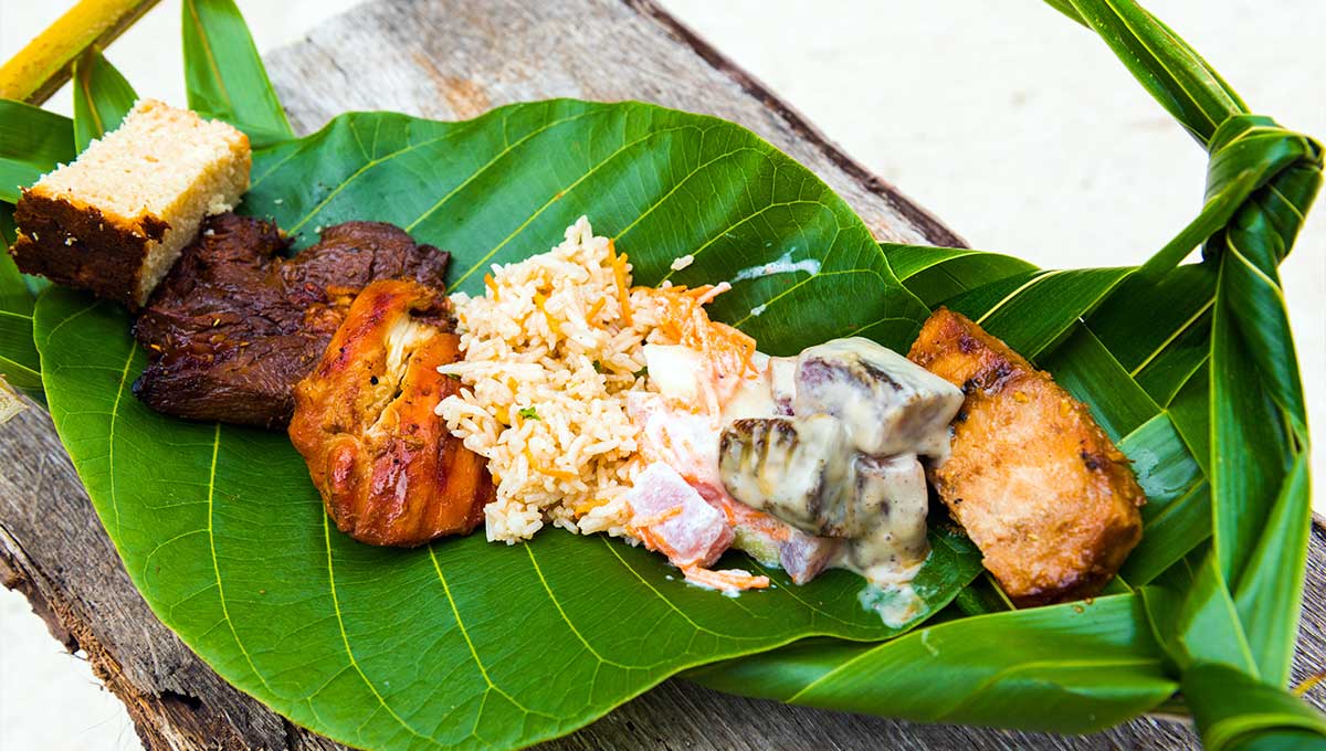 Fried meat with rice on a banana leaf: Bora Bora, French Polynesia